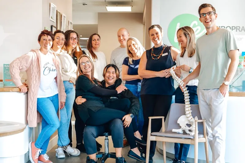The Life Chiropractic chiropractors and clinic team gathered in reception
